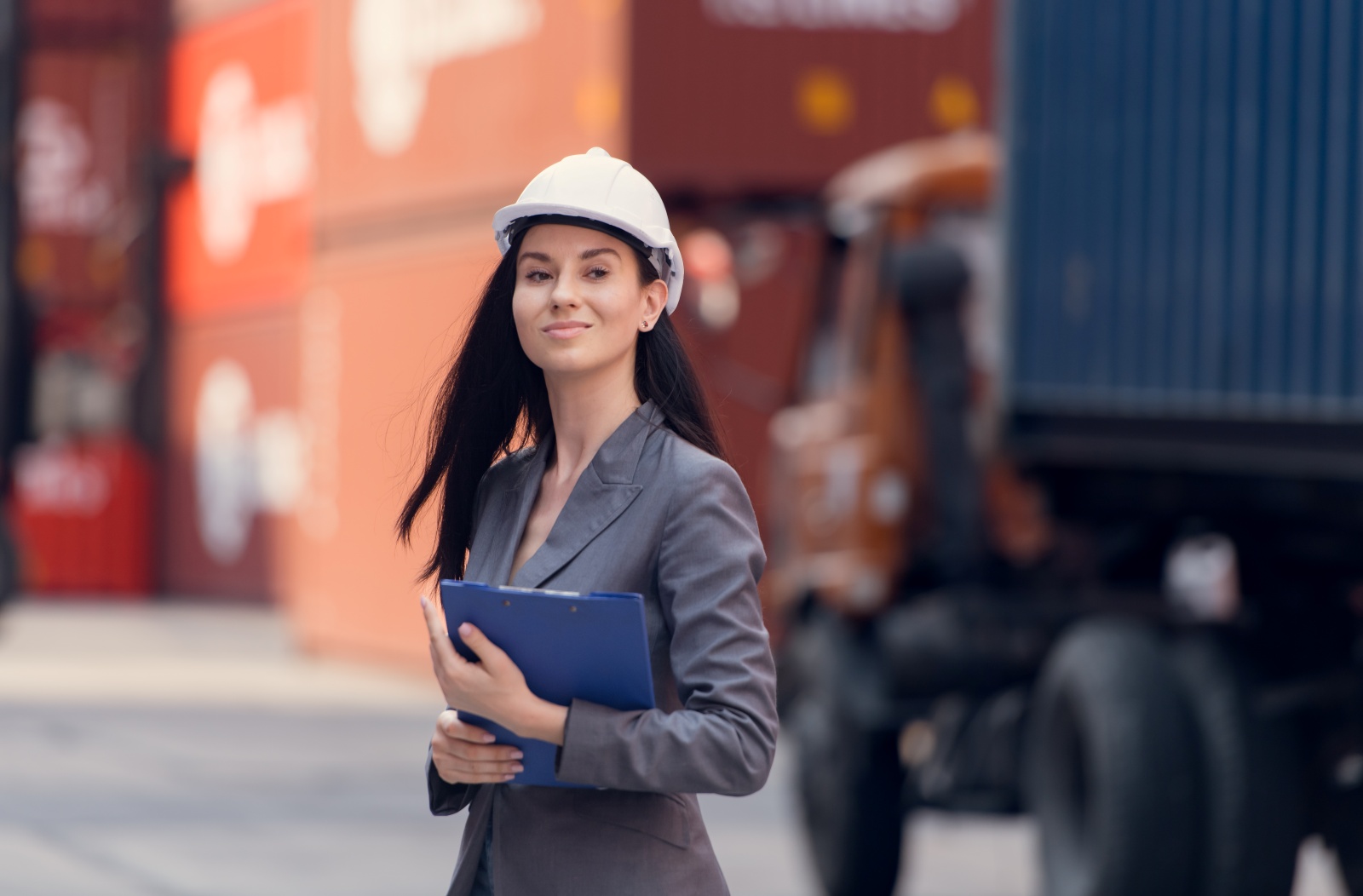 portrait young businesswomen survey area plan storage moving goods | Logistics and Supply Chain Courses